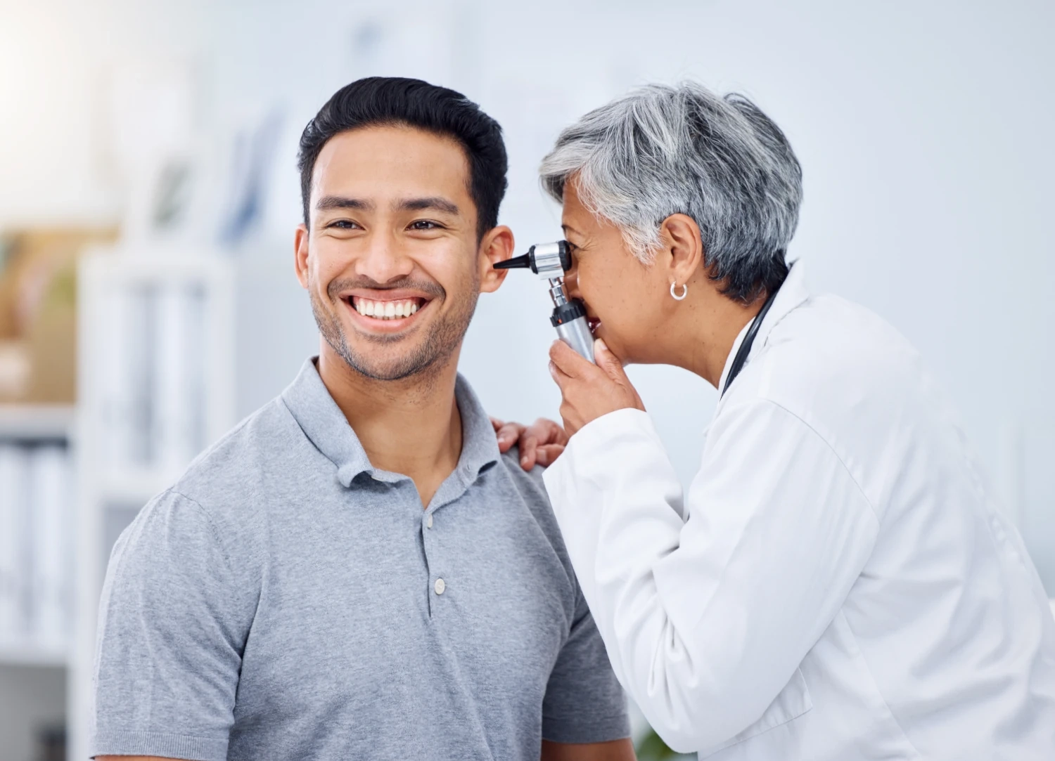 doctor examining ear