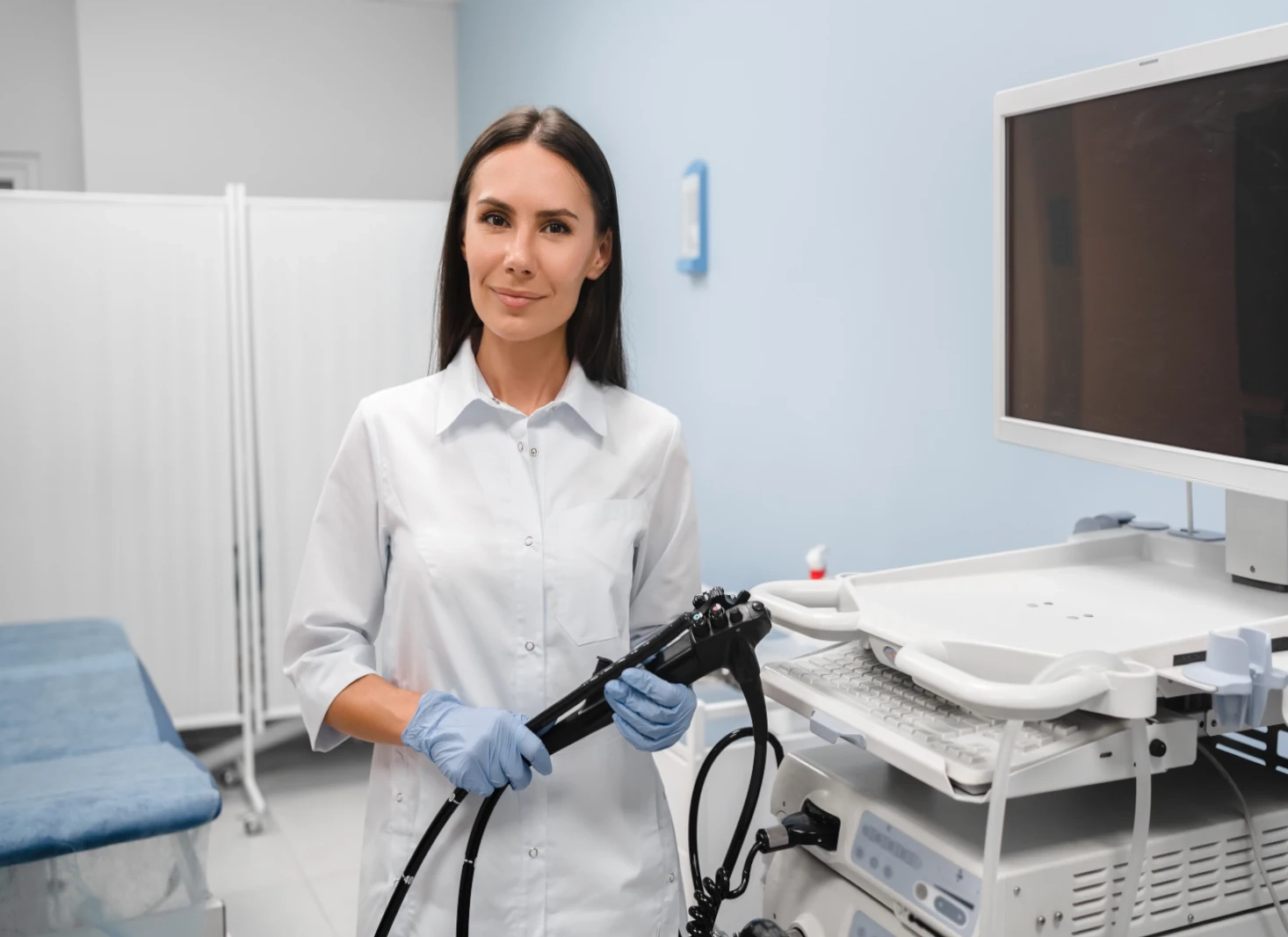 doctor holding gastro tool