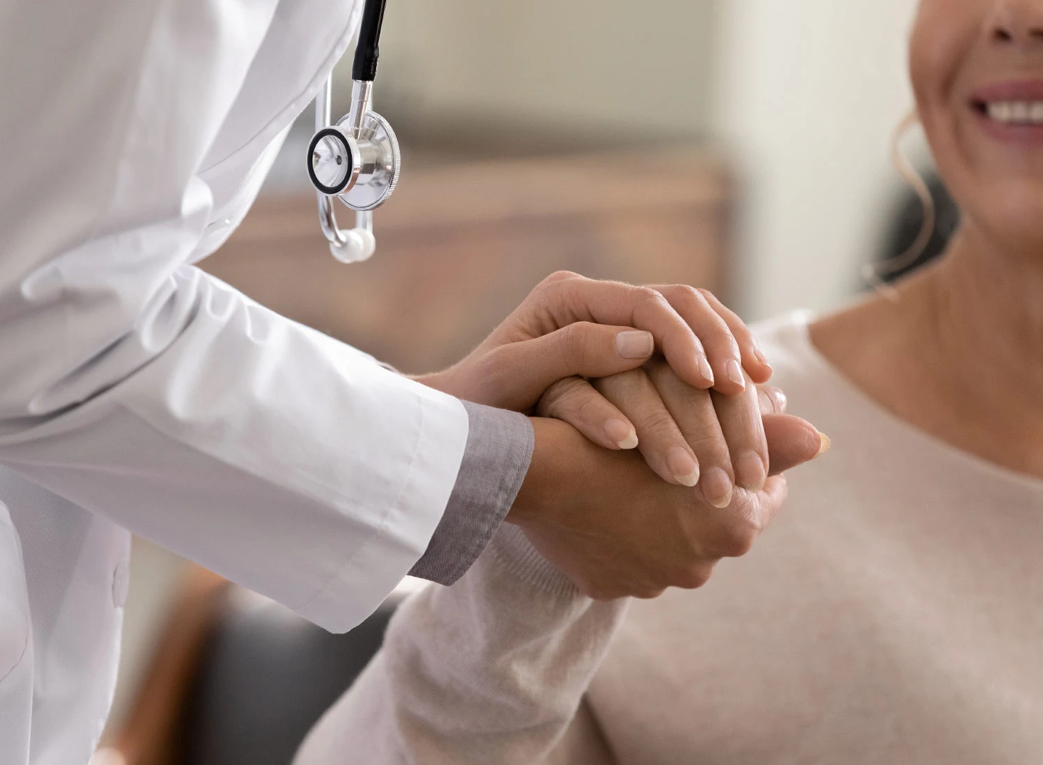 doctor holding hands with trust