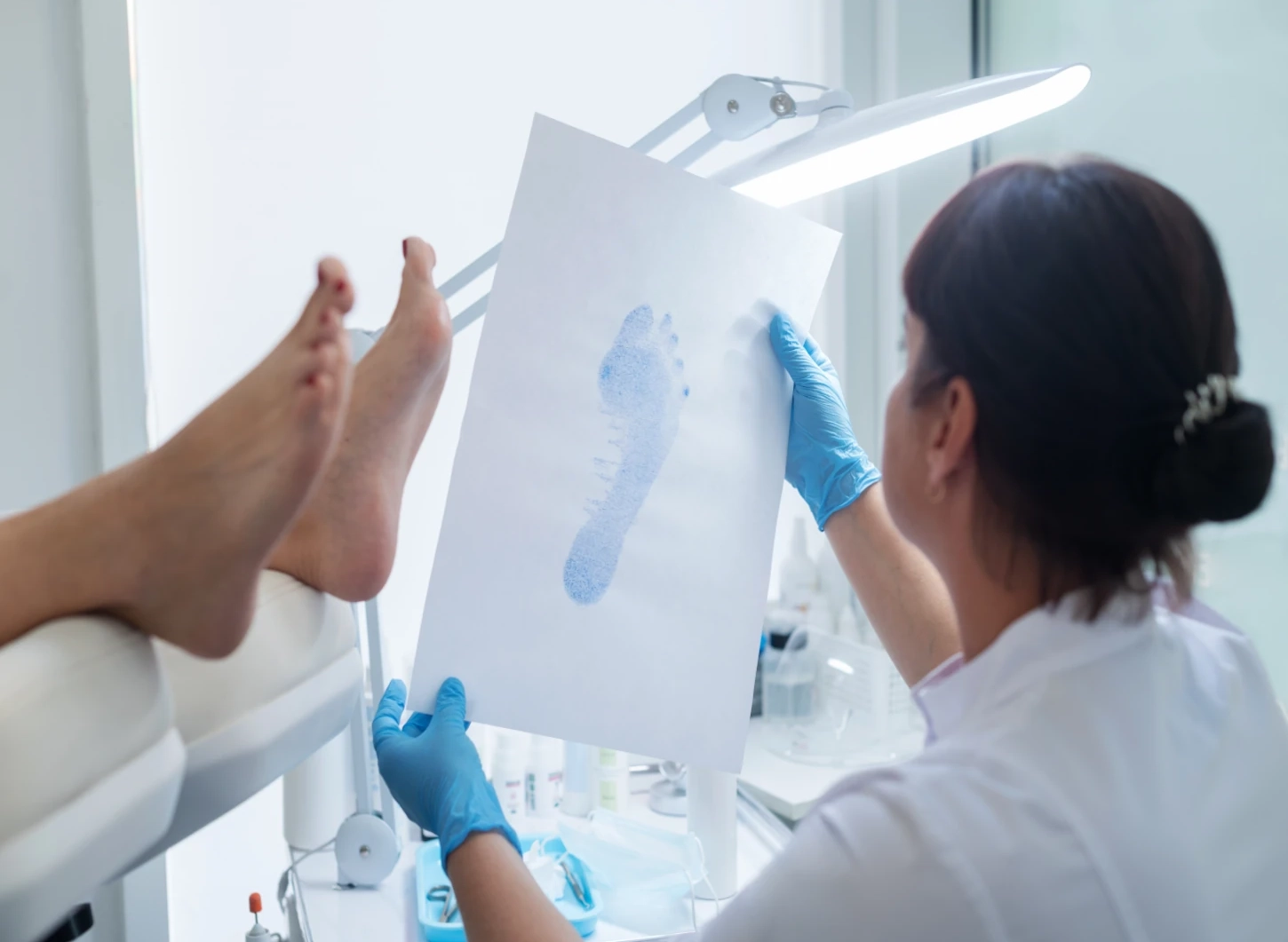 doctor taking imprint of foot