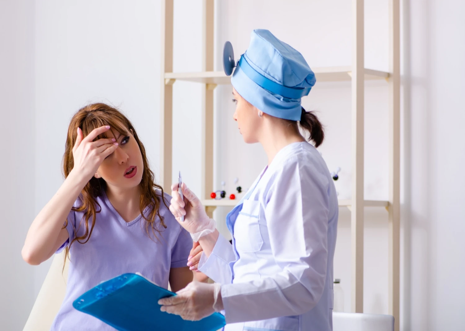 doctor talking with patient