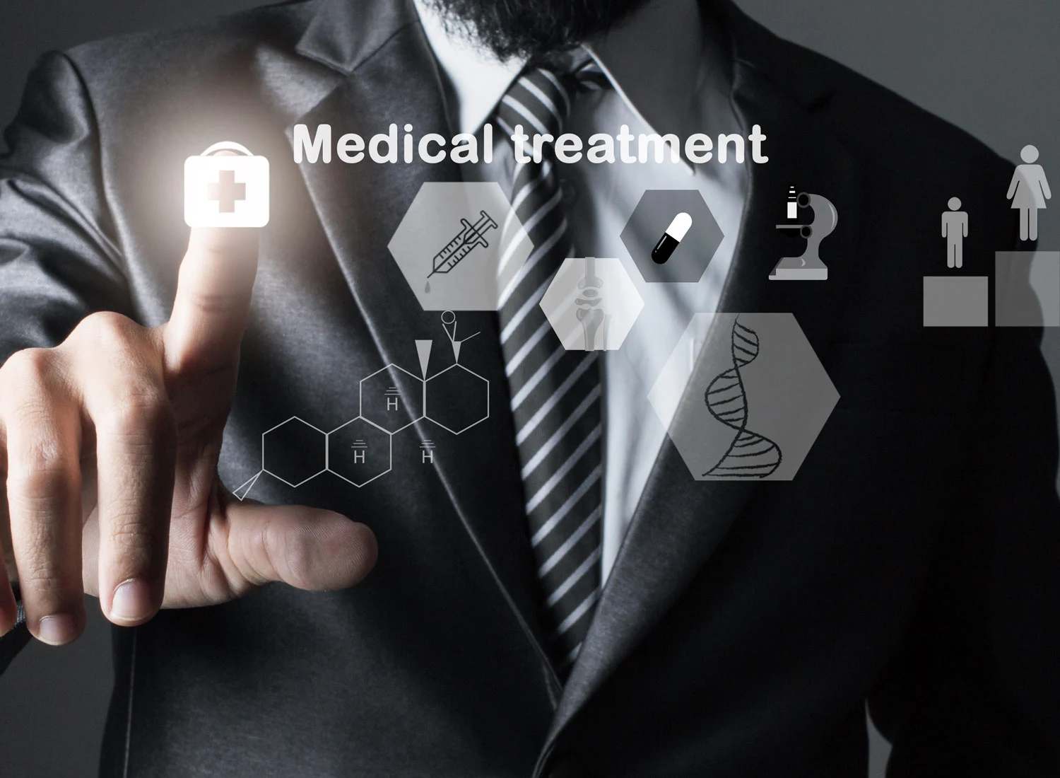 man in suit pressing medical treatment