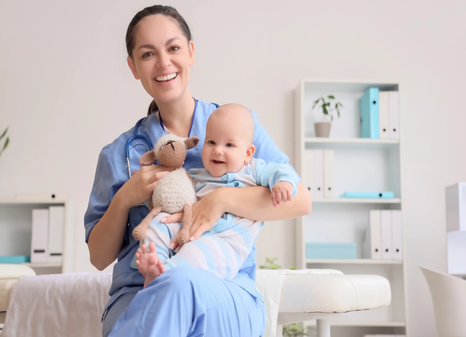 pediatrician with baby