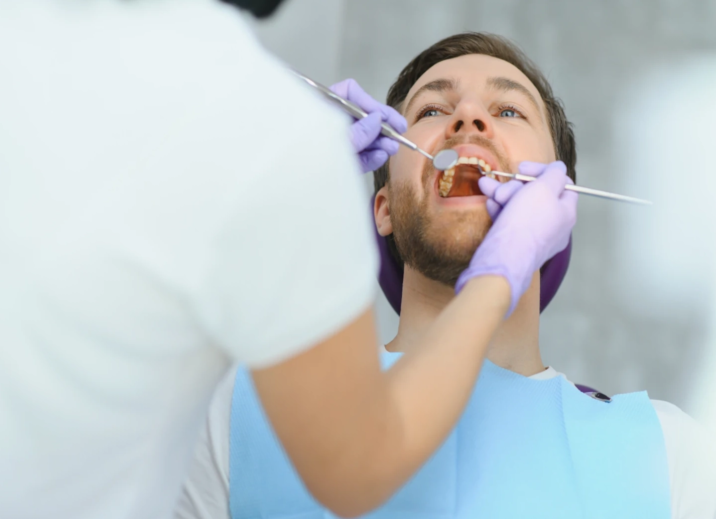 person with mouth open exam