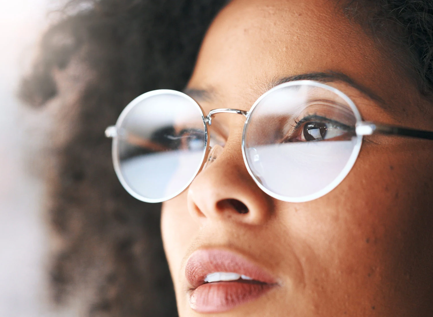 woman looking with glasses