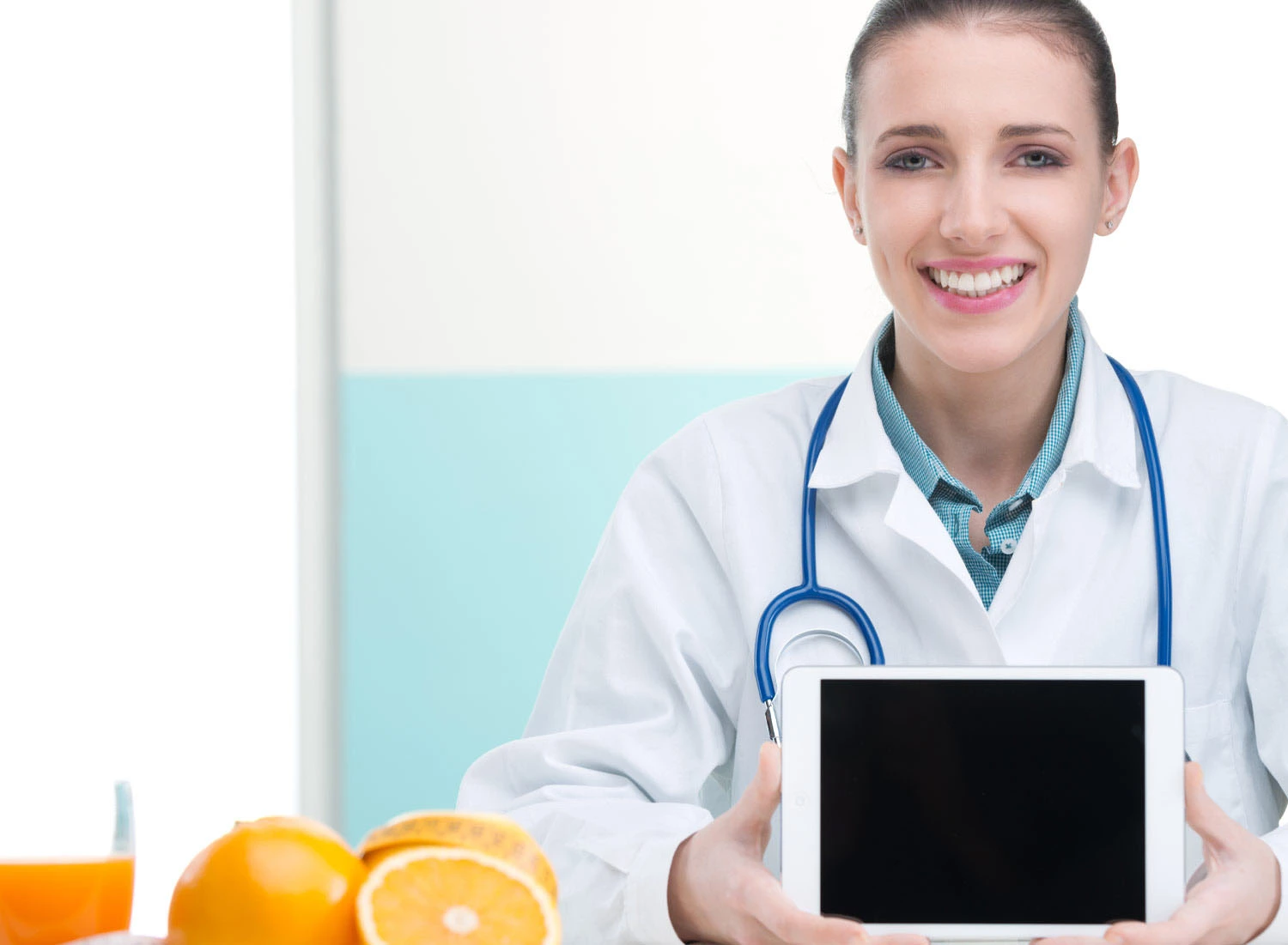 doctor holding tablet