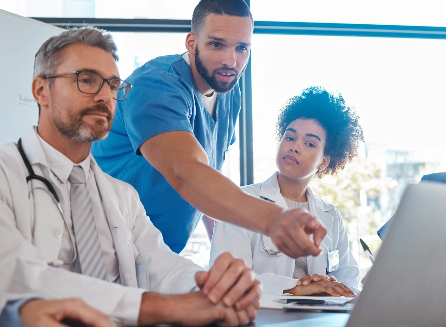 doctors collaborating over data