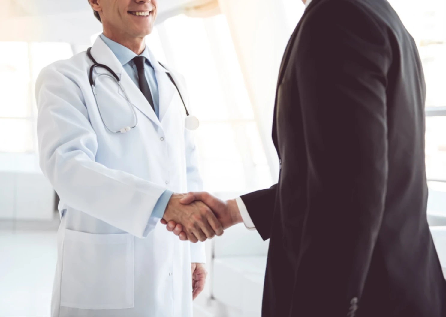 doctor shaking hands