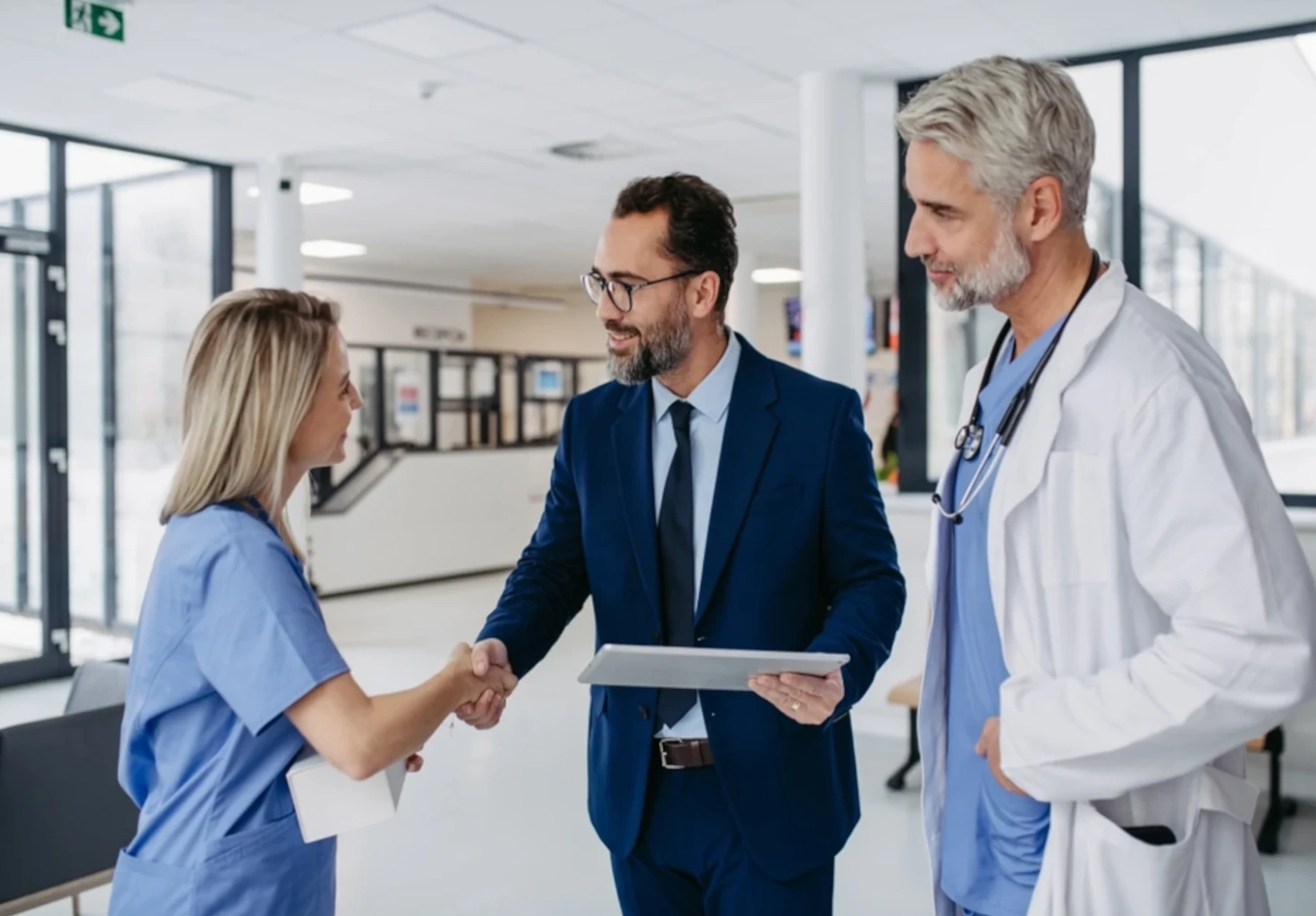 man shaking nurse hand