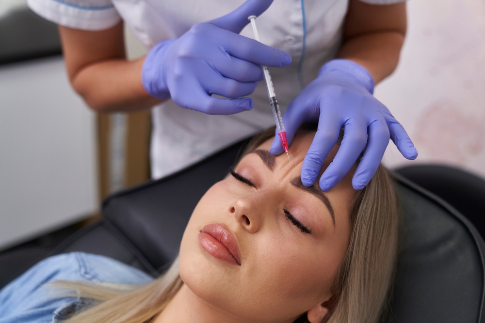 woman in a med spa getting injectables